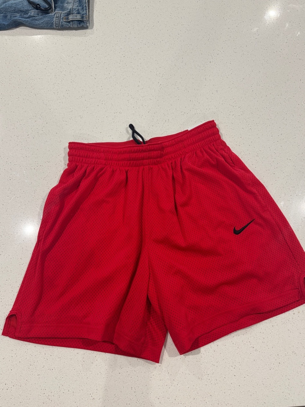 Nike Men’s Red Mesh Athletic Shorts with Black Swoosh